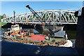 Ship passes open London Road Swing Bridge, Stockton Heath