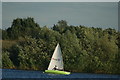 TQ4590 : View of a sailing boat on the lake in Fairlop Waters #10 by Robert Lamb
