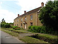 Stream-side house in Dowlish Wake