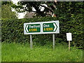 Road sign on the A1066 The Street