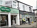 SJ9494 : Specsavers moving by Gerald England