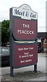 Sign for the Peacock public house, Clifton