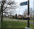 Cycle route direction sign on a Cheltenham corner