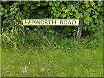 TL9877 : Hepworth Road sign by Geographer