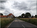TL9978 : Entering Hopton on the B1111 Bury Road by Geographer