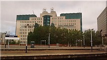TQ3077 : View of the MI6 building from a Strawberry Hill-bound train at Vauxhall Station by Robert Lamb