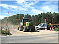 Tractor waiting to cross the A1151 road