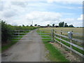 Gated track to Newton Barn Farm