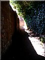 Throop: the shadow of a wall on footpath K26