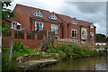 Modern housing overlooking the Coventry Canal by bridge No 20