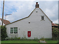 House with post box, Marton