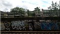 Graffiti on former railway viaduct, between Wandsworth Town and Putney