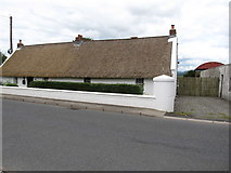 J0707 : Thatched farmstead cottage on the north side of the Point Road by Eric Jones