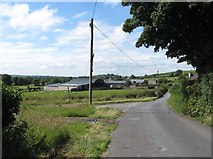 J2834 : Farm buildings beyond the junction of the Lackan and Letalian Roads, Kilcoo by Eric Jones