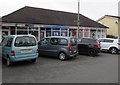 Four cars, four shops, Lewis Buildings, Porthcawl