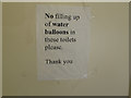 TQ2479 : "No filling up of water balloons in these toilets please" by David Hawgood