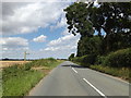 TM0572 : B1113 Finningham Road & footpath by Geographer
