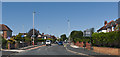 The end of New Cut Lane and the traffic lights on Halsall Road