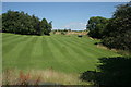 Newly mown grass beside Newmill House