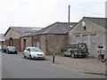 Three industrial buildings built in different materials