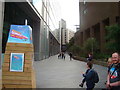 View of one of the buildings in More London reflected in a building on the South Bank #2