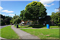 Parish noticeboard and play area in North Nibley