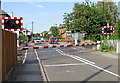 Barriers down across Adelaide Road level crossing, St Denys, Southampton