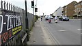 The A259 passes Kingston Lane at traffic lights