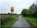 Approaching the level crossing on Leigh Lane