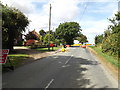 TM0570 : B1113 Walsham Road & Robbs Hall Postbox by Geographer
