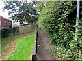 Metal barriers across a path above Bosworth Drive, Newport