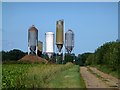 TF6305 : An eclectic mix of feed silos in Norfolk by Richard Humphrey