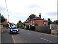 TQ9557 : The Street, Newnham by Chris Whippet