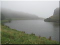 NT2873 : Dunsapie Loch in drizzle by M J Richardson