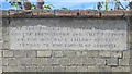 Inscribed stone in Mill Street by Rolly