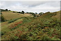 Looking west along the castle earthworks with the keep mound right