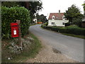 TL9369 : Grimstone End Postbox & Mill Road by Geographer