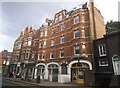 TQ2576 : Shops on New King's Road, Parsons Green by David Howard