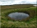 NS2673 : Bomb crater near Loch Thom by Lairich Rig