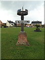 TM1686 : The Tivetshalls Village sign by Geographer