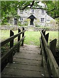 SS2926 : Footbridge and cottage, Mouth Mill by Philip Halling