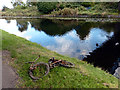 SJ3398 : Bits of an old bike has been dredged from the Leeds to Liverpool canal by Norman Caesar