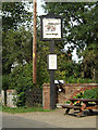 TM0691 : The Ox & Plough Public House sign by Geographer