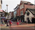 Big Issue seller in Hope Street, Wrexham