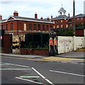 Depiction of two redcoat soldiers on a Shaw Heath corner, Stockport