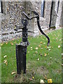 Churchyard pump of dubious practicality