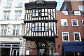 View of the entrance to St. Bartholomew the Great church from West Smithfield