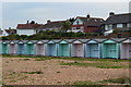 Beach huts and houses on the Esplanade at Eastney