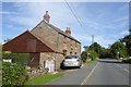 Stone-built house by A4112 in Leysters