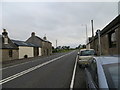 Road (A736) passing through Burnhouse